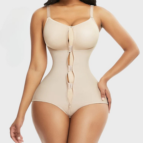 Beige bodysuit worn by a model on a plain background