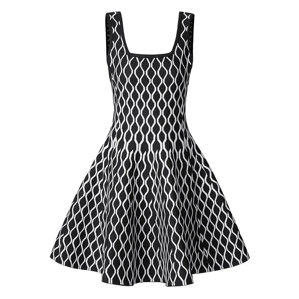 A sleeveless black and white patterned dress with a square neckline and a flared skirt, shown against a plain white background.