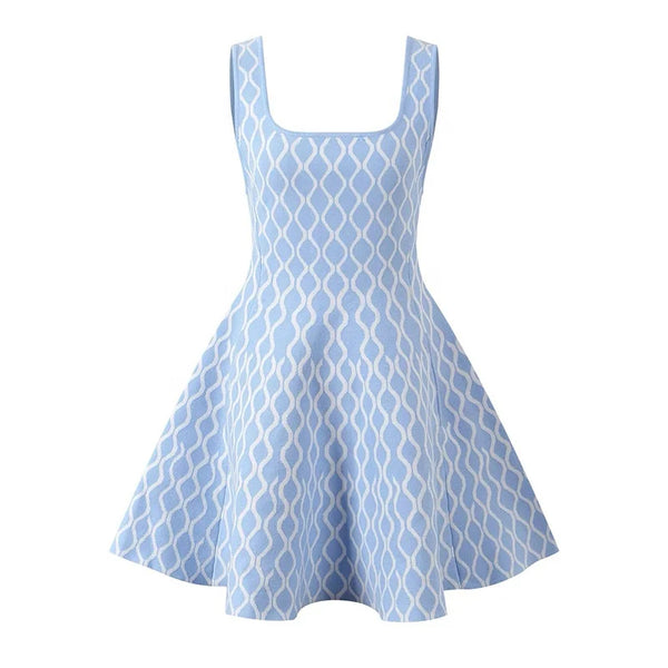 Light blue dress with white geometric pattern on a white background