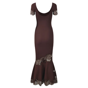 A dark brown ribbed knit dress with short lace sleeves and a flared ruffled hem, featuring decorative lace trim at the neckline and hem, shown against a plain white background.