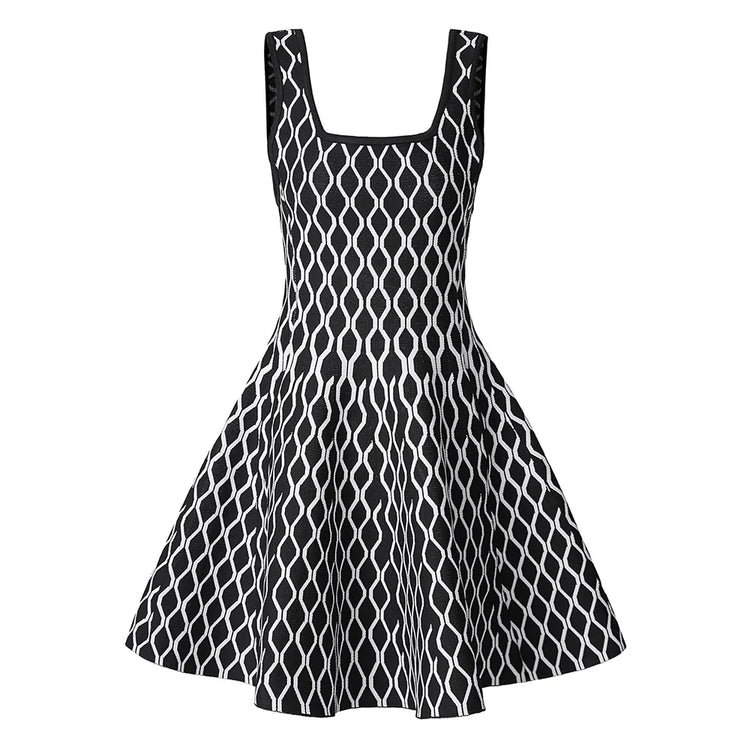 A sleeveless black and white patterned dress with a square neckline and a flared skirt, shown against a plain white background.