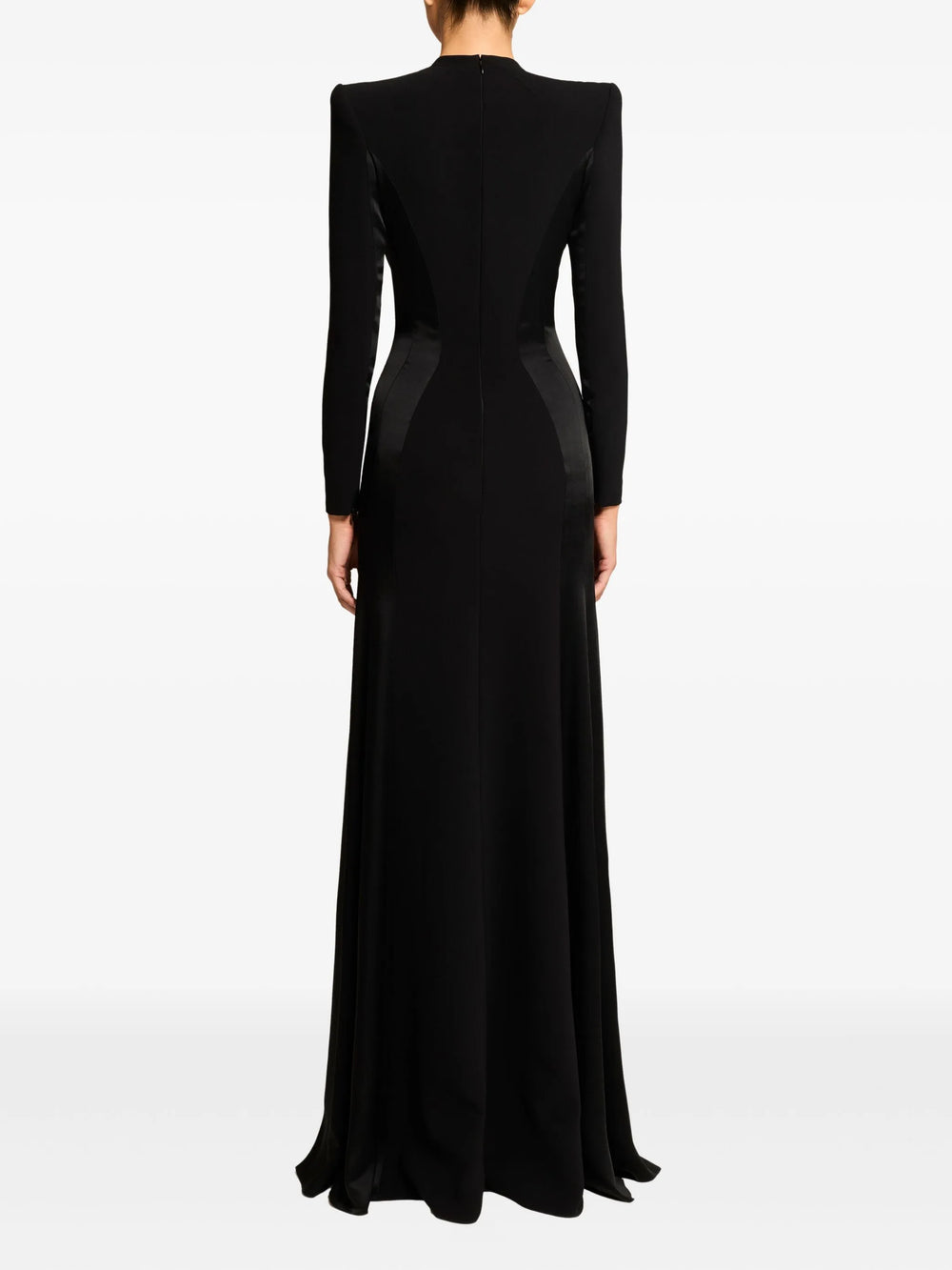 Black evening gown with silver embellishments on a white background