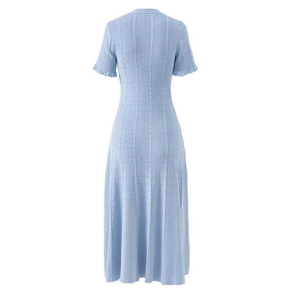 Light blue ribbed dress on a white background