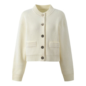 Cream-colored knit cardigan with buttons on a white background