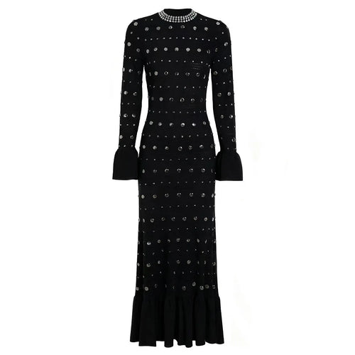 Black dress with silver embellishments on a white background