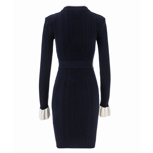 Navy ribbed dress with long sleeves on a white background
