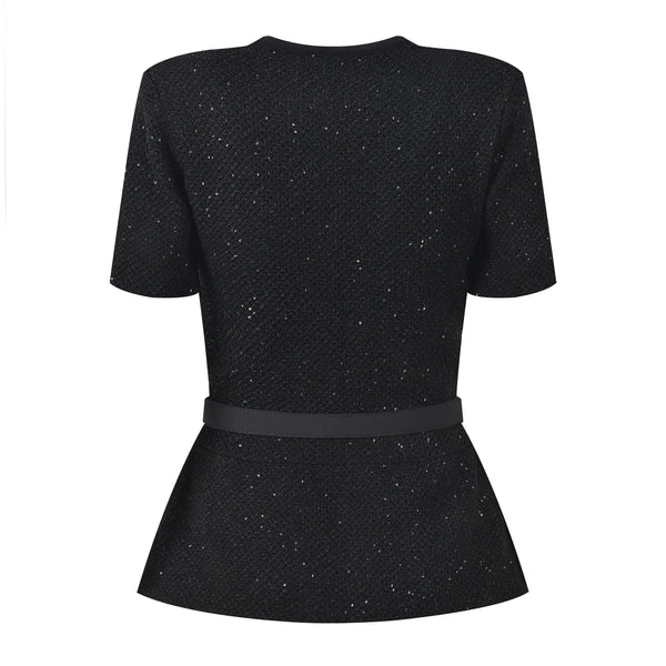 Black textured dress with a belt on a white background