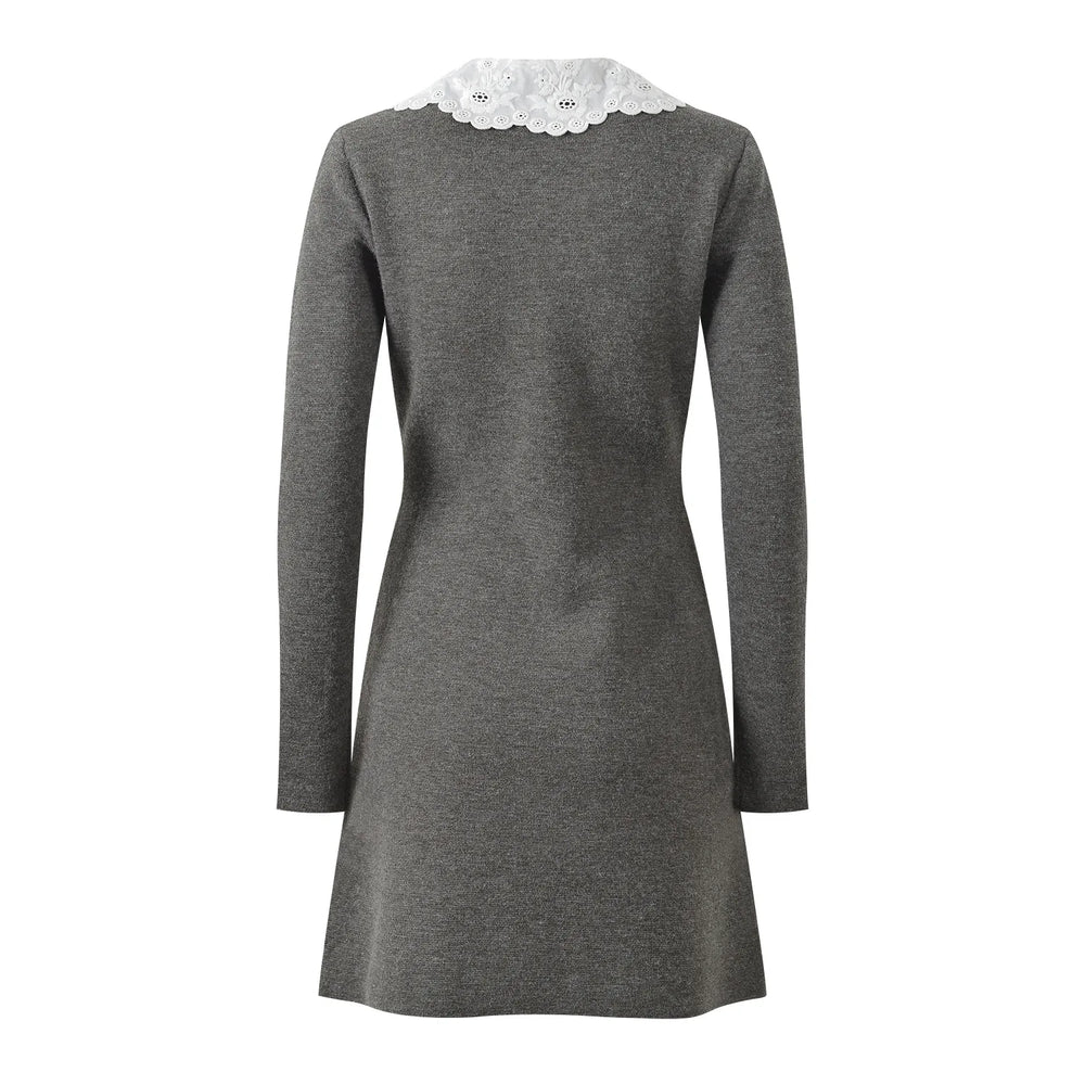 Gray dress with white lace collar on a white background