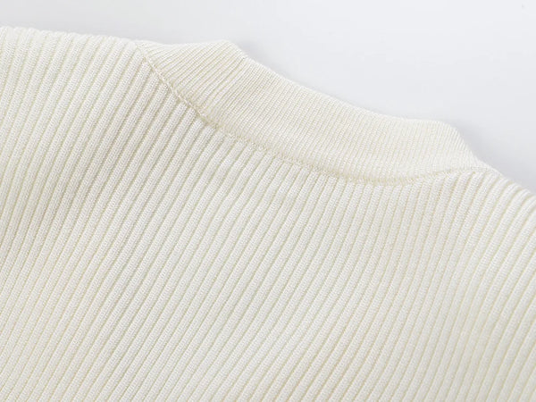 Close-up of a textured beige fabric on a white background