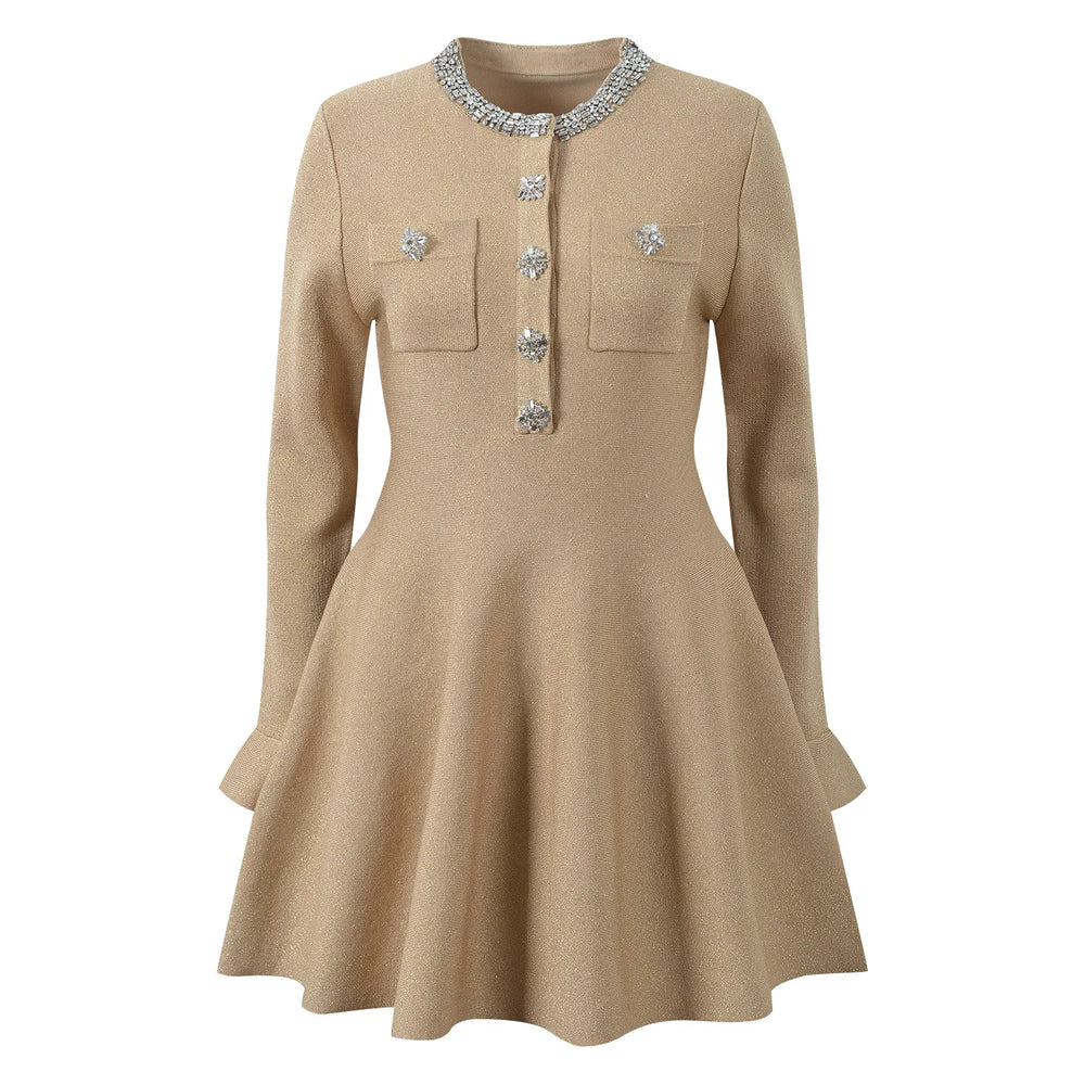 Beige dress with decorative buttons on a white background