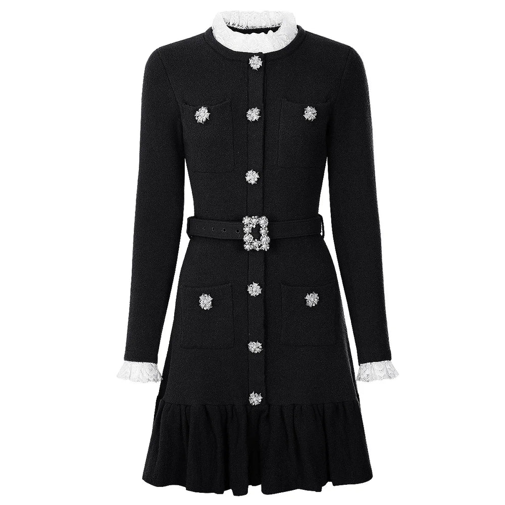Black dress with silver buttons and a belt on a white background