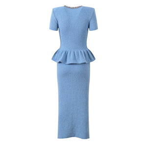 Blue peplum dress on a white background