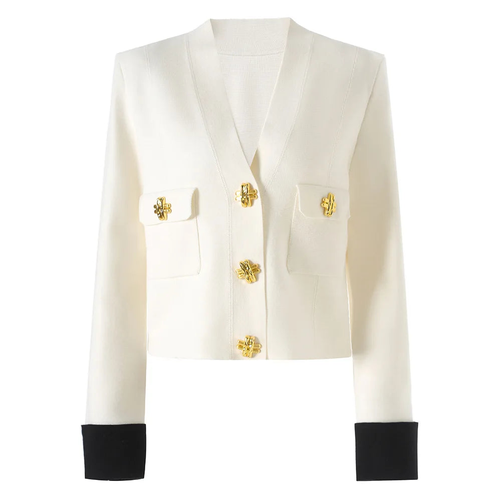 White blazer with gold buttons and black cuffs on a white background
