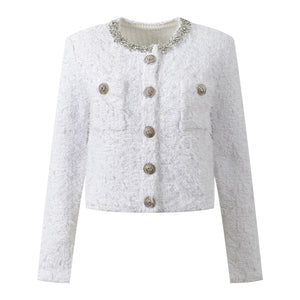 White textured jacket with decorative buttons on a white background