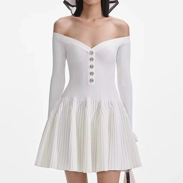 White off-shoulder dress with pleated skirt on a white background