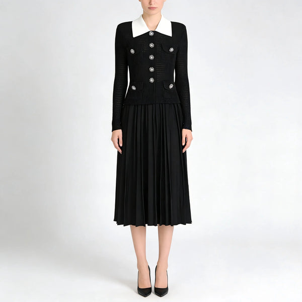 Black dress with white collar on a white background