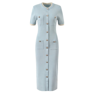 Light blue dress with buttons on a white background