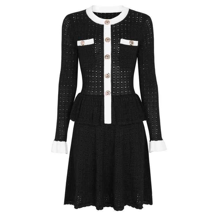 White dress with black accents and buttons on a white background