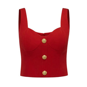 Red crop top with gold buttons on a white background