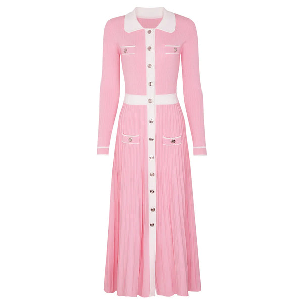 Pink dress with white collar and buttons on a white background