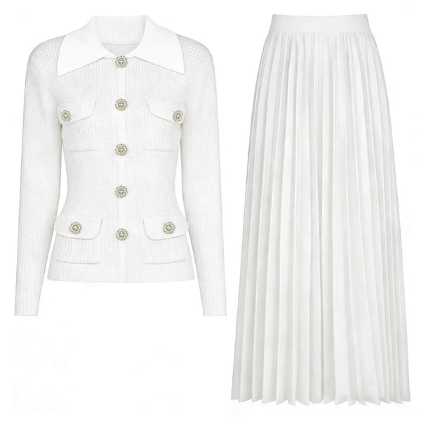 White blazer with button details and a white pleated skirt on a white background