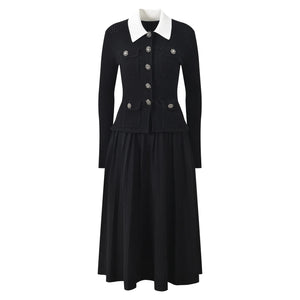 Black dress with white collar on a white background