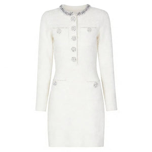 White coat with decorative buttons on a white background
