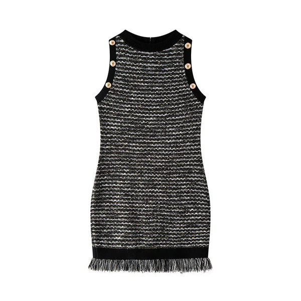 Black and white patterned dress with button details on a white background