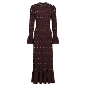 Long-sleeve dress with a pattern on a white background