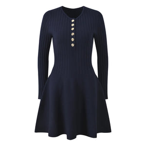 Navy blue dress with long sleeves and button details on a white background
