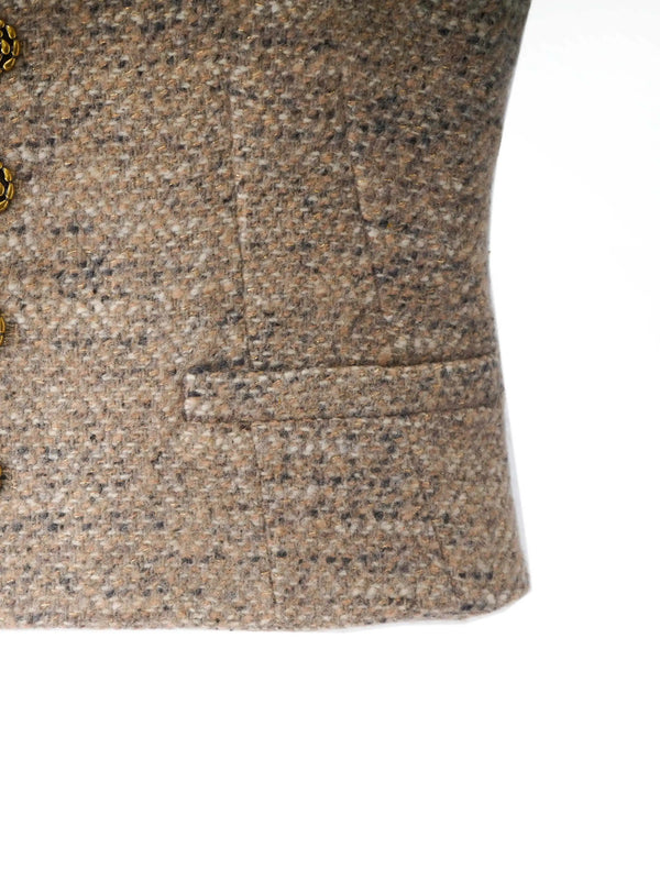 Close-up of a textured fabric with buttons on a white background