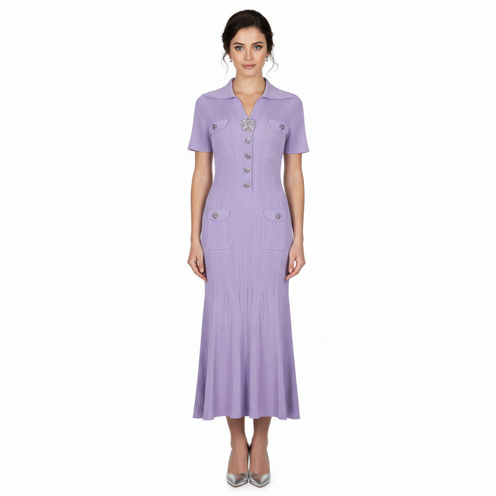 Purple dress with decorative buttons on a white background