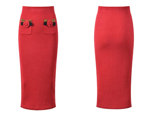 Red skirt with floral pocket details on a white background