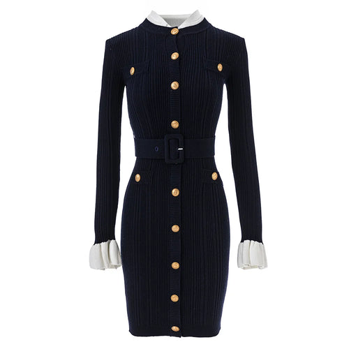 Navy ribbed dress with gold buttons and white cuffs on a white background