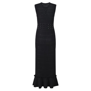 Black dress with embellishments on a white background