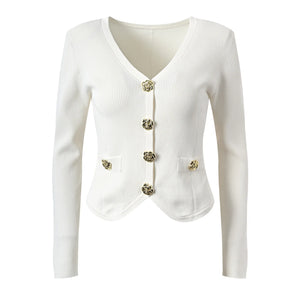 White blazer with gold buttons on a white background