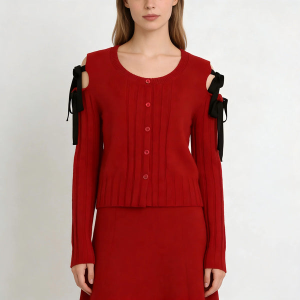 Red outfit with black shoulder accessories on a white background