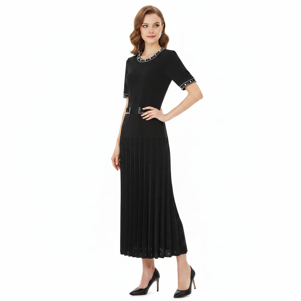 Black dress with decorative elements on a white background