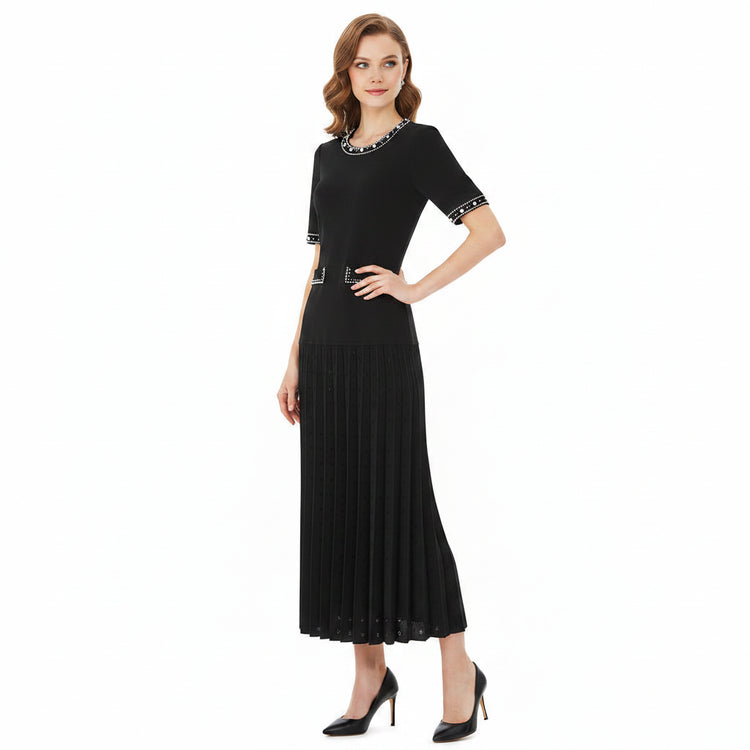 Black dress with decorative elements on a white background