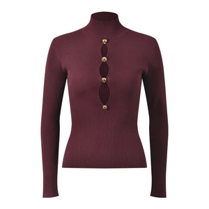 Maroon ribbed turtleneck sweater with decorative buttons on a white background