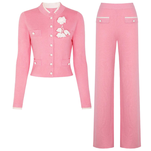 Pink outfit with a jacket and pants on a white background