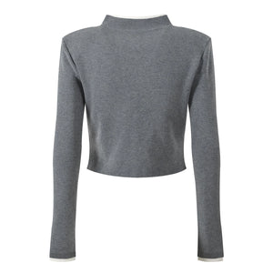 Gray long-sleeve top on a white background