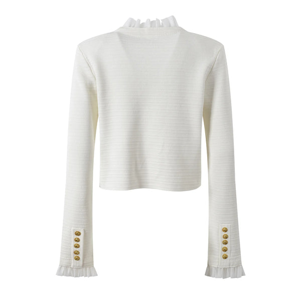 White ribbed sweater with gold buttons on a white background