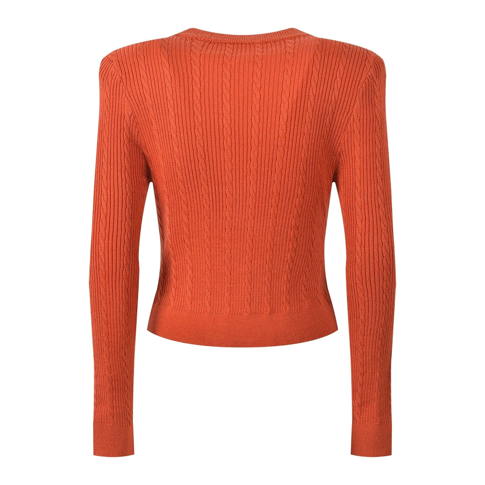 Orange ribbed sweater with gold buttons on a white background