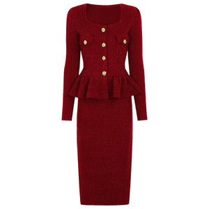 Red knitted dress with peplum waist and gold buttons on a white background