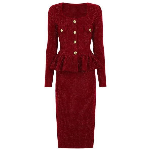 Red knitted dress with peplum waist and gold buttons on a white background