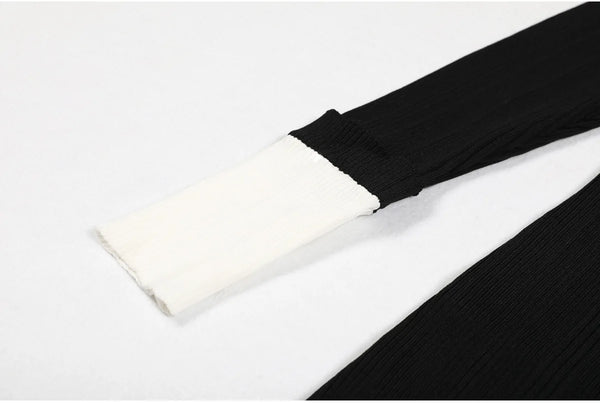 Black and white pleated fabric on a white background