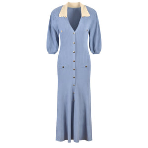 Blue dress with a white collar on a white background