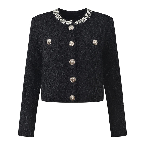 Black textured jacket with silver buttons and embellished collar on a white background