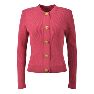 Pink ribbed sweater with gold buttons on a white background